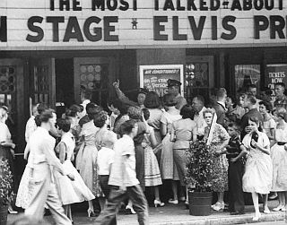 Aug 1956: Elvis Presley fans in Jacksonville, Fl wait for ticket box office to open. Photo, R. Kelley, Life magazine.