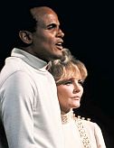 Harry Belafonte and Petula Clark singing during 1968 TV show with “controversial” touching scene that one Chrysler sponsor wanted removed.