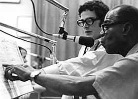 Artie Butler and Louis Armstrong at work in a late-night Las Vegas recording session that was reportedly made easier by Armstrong's good-natured levity.