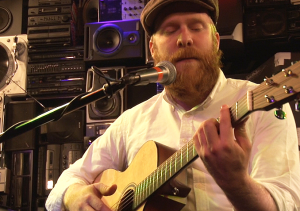 Alex Clare performing with guitar. Photo, Jay Tilles.