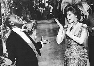 Louis Armstrong and Barbra Streisand in a scene from the film version of “Hello, Dolly!” Click for DVD.