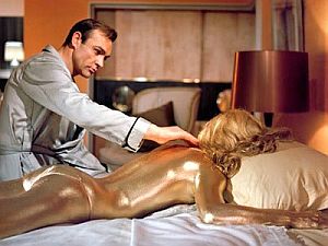 Jill is later murdered by Goldfinger with gold paint.