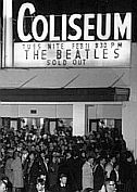 Fans milling around outside the Coliseum in Washington, D.C. in 1964 waiting for the Beatles to arrive.