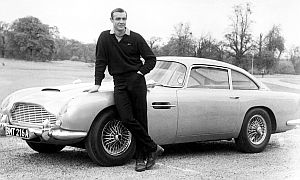Sean Connery with famous James Bond sports car, the Austin Martin DB-5, complete with ejector seat!