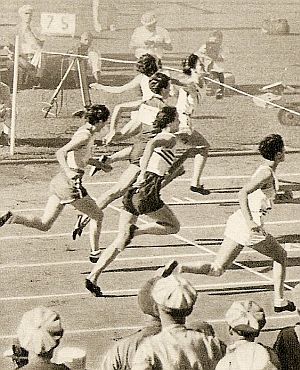 Babe Didrikson, 2nd from left at tape in hurdles race, ahead of  Evelyne Hall, for gold medal, 1932 Olympics.