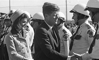 President & Mrs. Kennedy greeting Fort Worth police force on departure to Dallas from Carswell AFB, 22 Nov 1963.