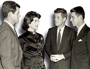 March 1958: Jacqueline Kennedy with the three Kennedy brothers at University of Virginia in Charlottesville, VA,  where Teddy (left) was then a student, Bobby (right)  a law school graduate, and JFK (center), there to give a speech at the Law School’s first Law Day.