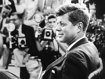 August 1959: Senator John F. Kennedy during session with the press in Omaha, Nebraska.  Photo, Jacques Lowe.