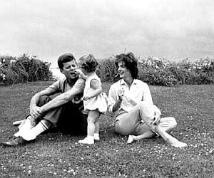 1959: JFK, daughter Caroline, and Jackie near the shoreline at Hyannis Port, MA.  Photo, Mark Shaw.