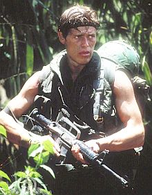 Actor Willem Dafoe plays U.S. Army Sgt. Elias in 1986 Vietnam War film, “Platoon.”