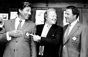 July 1985: Joe Namath, left, Roone Arledge, center, with Frank Gifford at news conference announcing Namath’s joining "Monday Night Football." AP / M. Lederhandler.