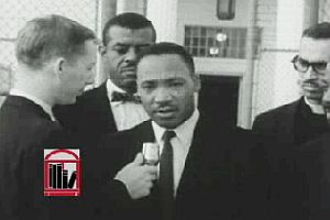 Dr. Martin Luther King, Jr. being interviewed by WSB-TV reporter upon leaving the Georgia State Prison at Reidsville, Oct 27, 1960. Civil Rights Digital Library.