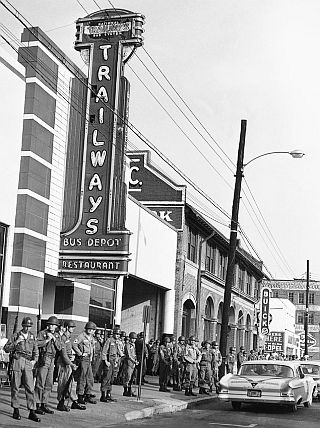 May 24, 1961: National Guard troops line sidewalk at  at bus station in Montgomery, AL as Freedom Riders plan to resume bus trips. Photo, AP / Horace Cort.