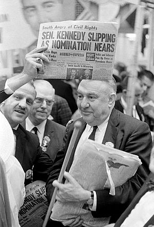 July 13th: North Carolina delegates and LBJ supporters, Gov. Luther Hodges (holding paper) and Senator Sam Ervin Jr., right, at the DNC. Rumor had it that Kennedy was slipping in his bid for the nomination, as Southern delegates battled over civil rights and other issues.
