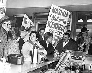 January 24, 1960: JFK & Jackie, campaigning in Nashua, N.H., sit at local lunch counter and chat with townsfolk.