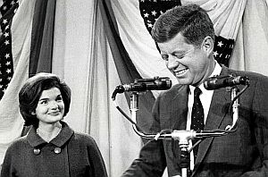November 9, 1960: A beaming Jackie Kennedy and a happy JFK, during his acceptance speech  at the Hyannis Armory in Massachusetts following the long election night.