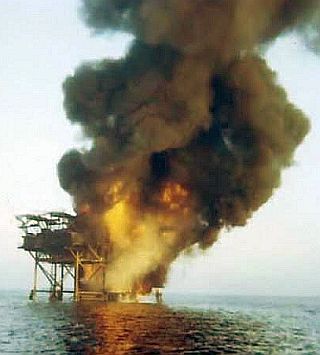 December 1970: Shell offshore oil rig blaze in the Gulf of Mexico. Photo, Bob King, aboard ‘Dependable’.