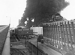 August 1975: View of the Gulf refinery fire from Penrose Bridge, looking west. Photo, Temple University
