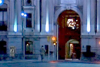 Rocky (lower center-left) continues his run into center city Phila-delphia and through the City Hall passageway on Broad St.