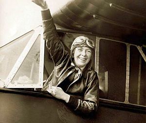 April 24, 1929: Elinor Smith, 17, waves from the cockpit of her Bellanca CH 300 Pacemaker after setting an endurance record from Roosevelt Field, Long Island, NY.  Photo, Newsday