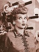 Lucy offering a famous pose during a November 1953 episode of “I Love Lucy” involving knife throwing.