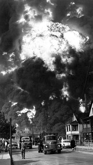 Aug 27, 1955: Explosion at the Whiting refinery as seen looking north on Berry Ave. from 129th St. Original Chicago Tribune caption noted: “A dark mushroom cloud, 8,000 feet high and visible for 30 miles, obscured the sun, effectively turning day into night.” Photo, John Austad