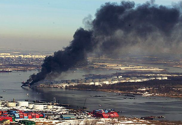 February 2003. A Bouchard Transportation Co. barge exploded & burned while unloading gasoline at the ExxonMobil docks at Port Mobil, Staten Island, NY, on the Arthur Kill waterway. Two workers were killed.