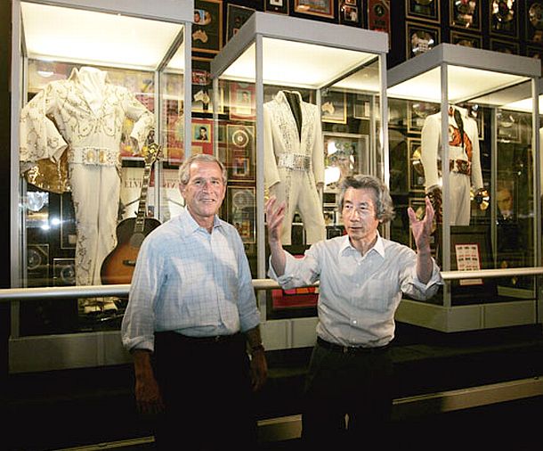 July 2006: President Bush and Japanese Prime Minister Koizumi in the awards section of Elvis Presley home at Graceland where various Presley costumes and recording awards are displayed.
