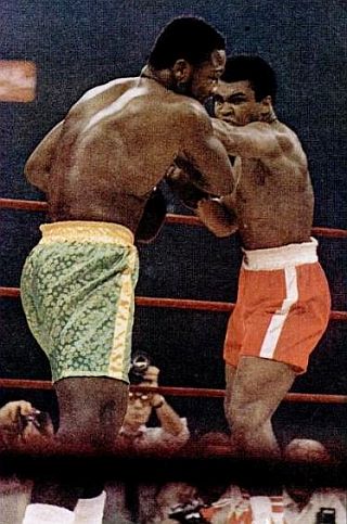 Life photo showing Ali working his jabs on Frazier, which throughout the night took a toll on Frazier’s head & face.