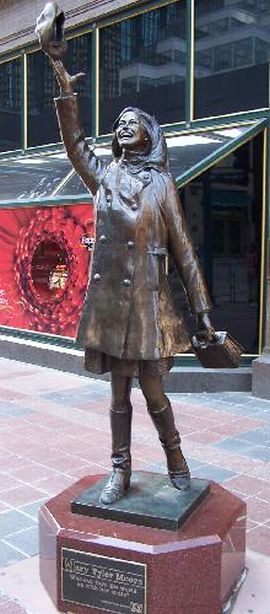 Statue of the fictional Mary Richards, the liberated TV producer of the “Mary Tyler Moore Show” (1970s) depicted tossing her tam into the air, a symbol of independence. Minneapolis, MN, 2002.
