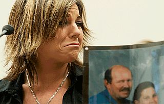 March 2007: Eva Rowe, at the same Congressional hearing noted above, turning emotional listening to testimony.