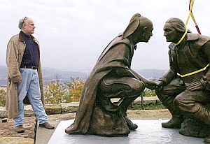 Sculptor James West at positioning of his works, 2006.