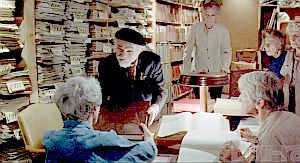 Sol at "Supreme Exchange," where fellow "books" concur with Sol's worst-case discovery.