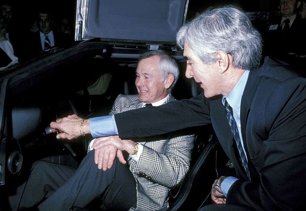 1981: John DeLorean at right showing famous late night talk show host, Johnny Carson  – also a DMC investor – some of the internal controls of a DeLorean Motor Car.