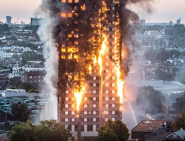 June 2017.  Photo of the Grenfell Tower high-rise fire in progress in London, believed to have been aided in its rapid spread by the building’s exterior cladding; panels which incorporated a polyethylene-filled core, and also, possibly, plastic insulation. 