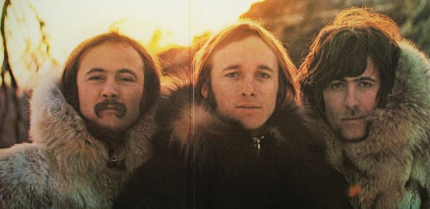 1969. The original 'Crosby, Stills & Nash' vinyl LP album was released in a gatefold-type record sleeve that included the above photo of the three musicians in large fur parkas shot against a sunset background in Big Bear, California. photo, Henry Diltz.