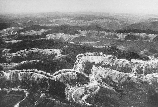 1967. Aerial view of contour strip mining's handiwork in Eastern Kentucky, with gouged-out mountainside scars running for miles to the far horizon. Source: “These Murdered Mountains,” Life, January 12, 1968, photo by Bob Gomel.
