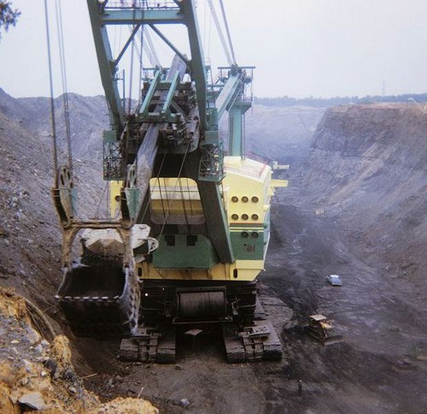 This giant strip mine shovel began work in 1962 at the Sinclair Mine in western Kentucky for Peabody Coal Company. Note small pick-up truck and bulldozer, lower right, dwarfed by the gigantic shovel.